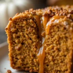 Chai Spice Maple Pumpkin Bread 3 Close-up of moist chai spice maple pumpkin bread slice with visible spices and maple glaze