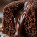 Chocolate Lava Cake 3 Close-up of a chocolate lava cake with molten chocolate center oozing out
