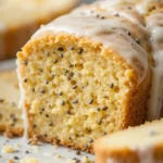 Lemon Poppy Seed Loaf 3 Close-up of moist lemon poppy seed loaf slice