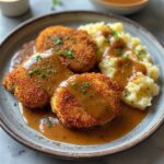 Breaded Pork Chops and Gravy Recipe 5 Close-up of Breaded Pork Chops with gravy
