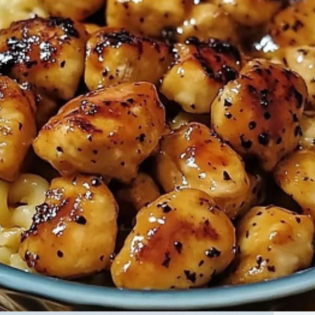Sweet and Spicy Honey Pepper Chicken 4 Crispy sweet and spicy honey pepper chicken garnished with green onions